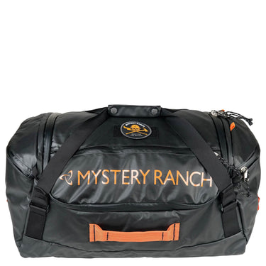 Mystery Ranch Mission Duffel 55 - Reisetasche/Reiserucksack (wildfire black) - Markenkoffer
