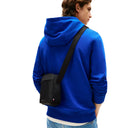 Tommy Hilfiger Repreve - Umhängetasche Mini 20 cm (schwarz) - Markenkoffer